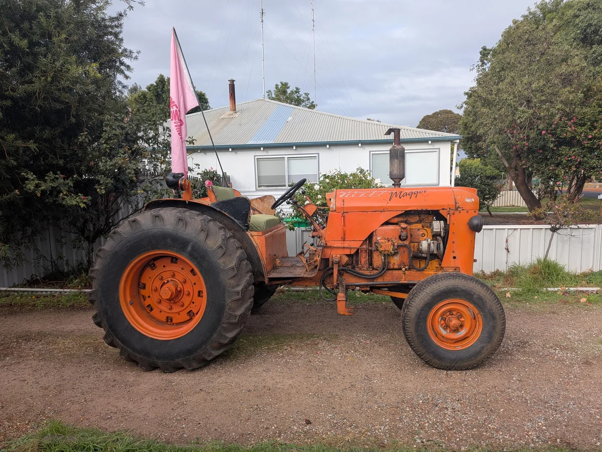 John setting off from Brunswick Junction in his open-top tractor