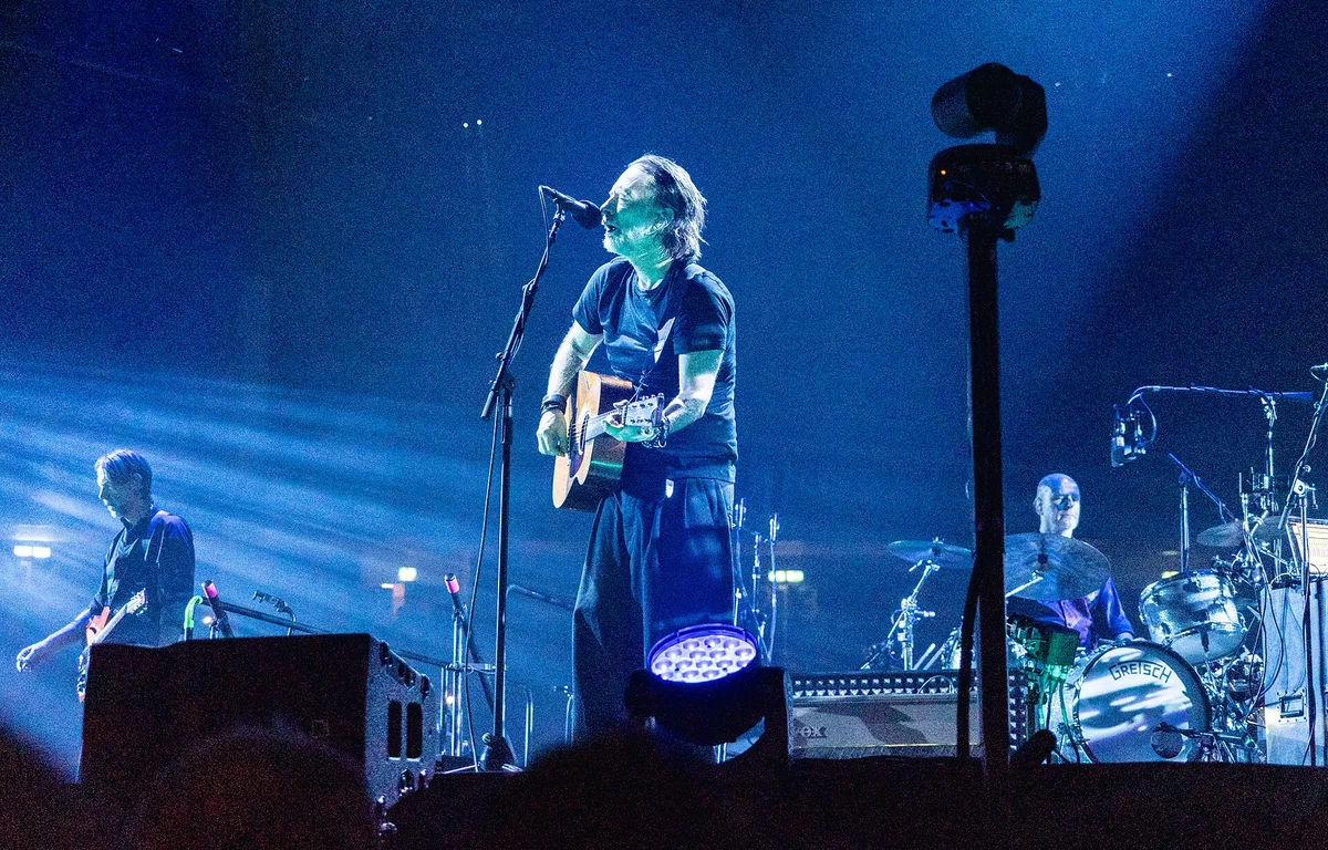 Radiohead performing live in 2025