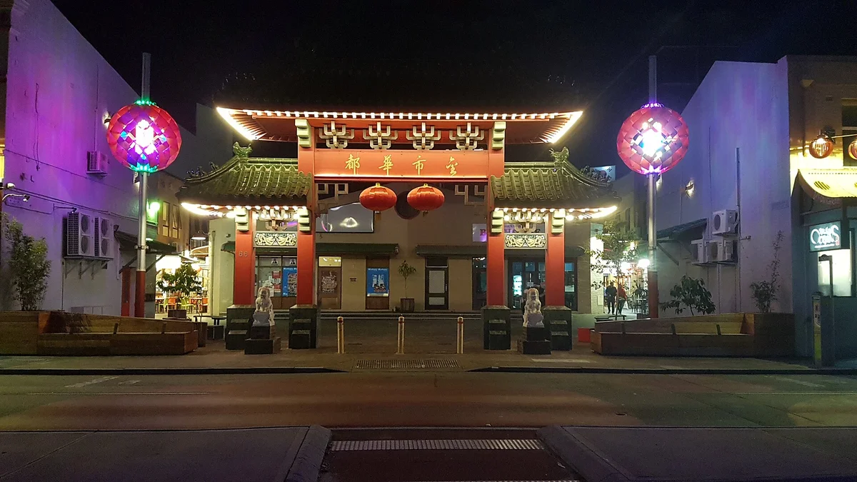 The Chinatown gate on Roe Street, Northbridge, lit up at night