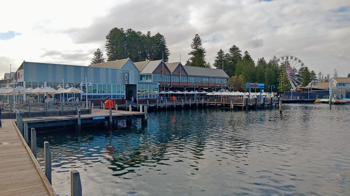 Fremantle Fishing Boat Harbour with Cicerello's and its boardwalk umbrellas across the water
